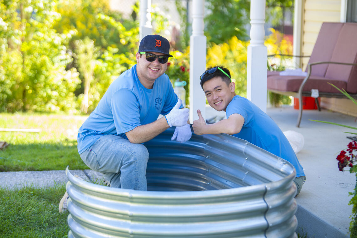 Colin Cusimano & Edo Pradjonggo participated in our annual Day of Service. Photo by Coyle Studios.