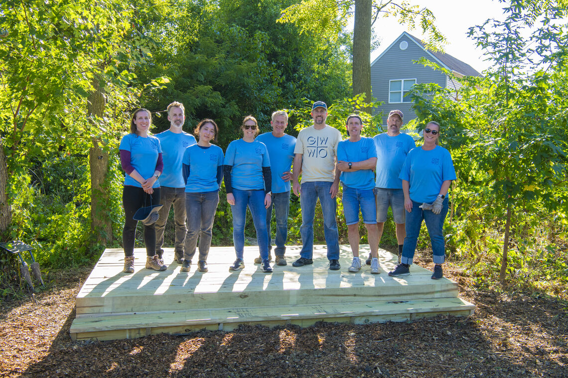 Sarah Lindquist, Andy Towne, Luying Peng, Linda Durand, Alan Reed, Brian Eschman, Eddie Foy, Bob Mock & Cara Blevins stood atop the new performance platform.