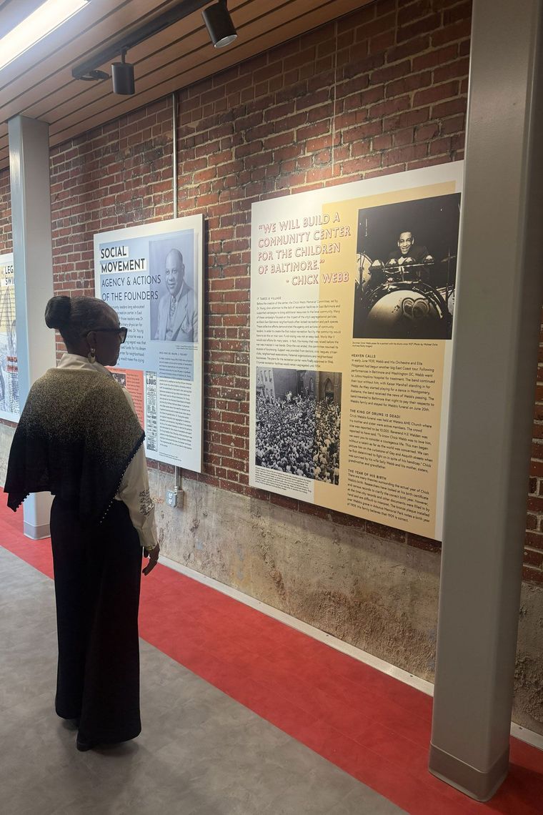 Exhibit panels document the life and legacy of Chick Webb and the community efforts that developed this center.